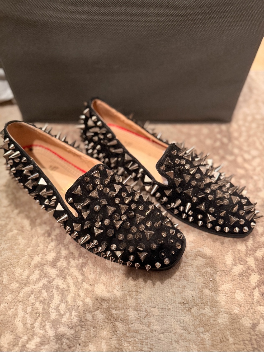 Christian Louboutin studded loafers.
